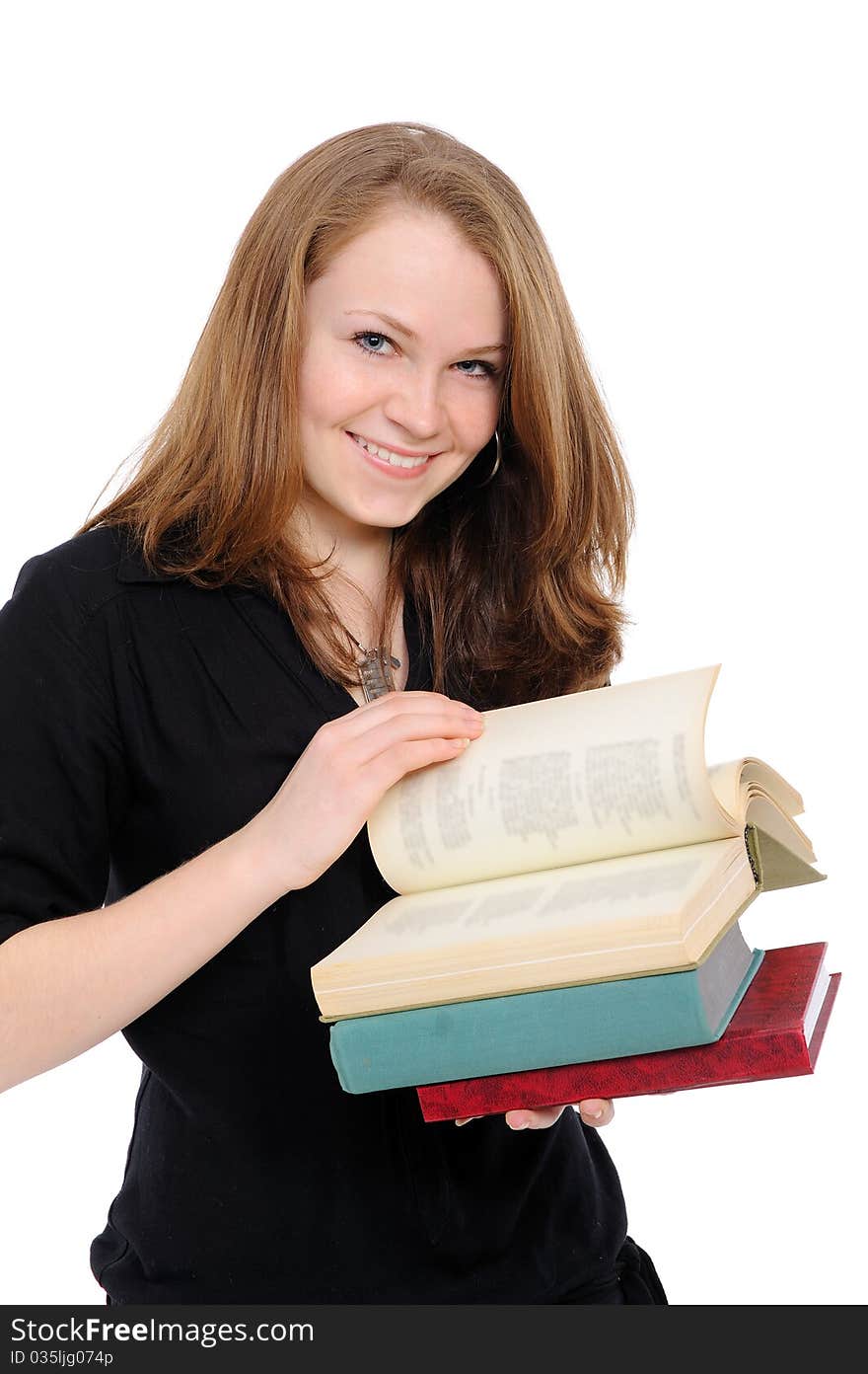 Young girl with long hair and book on a white background