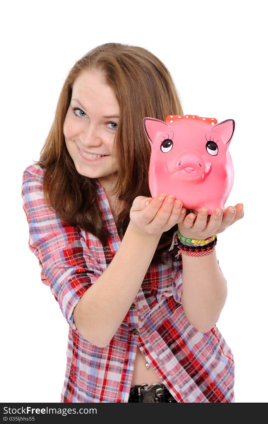 Young woman  with piggy bank