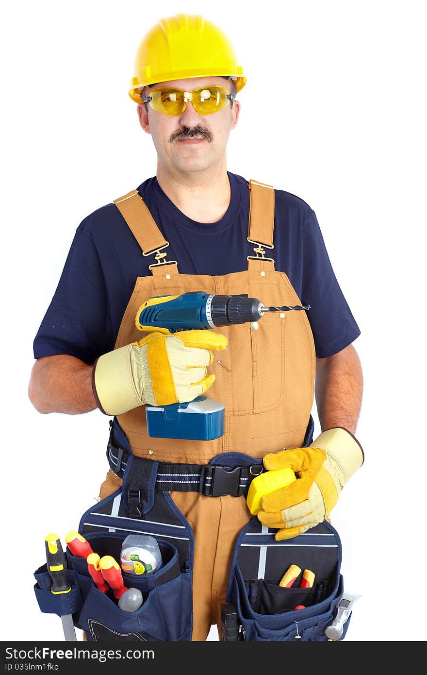 Mature contractor with a drill. Over white background