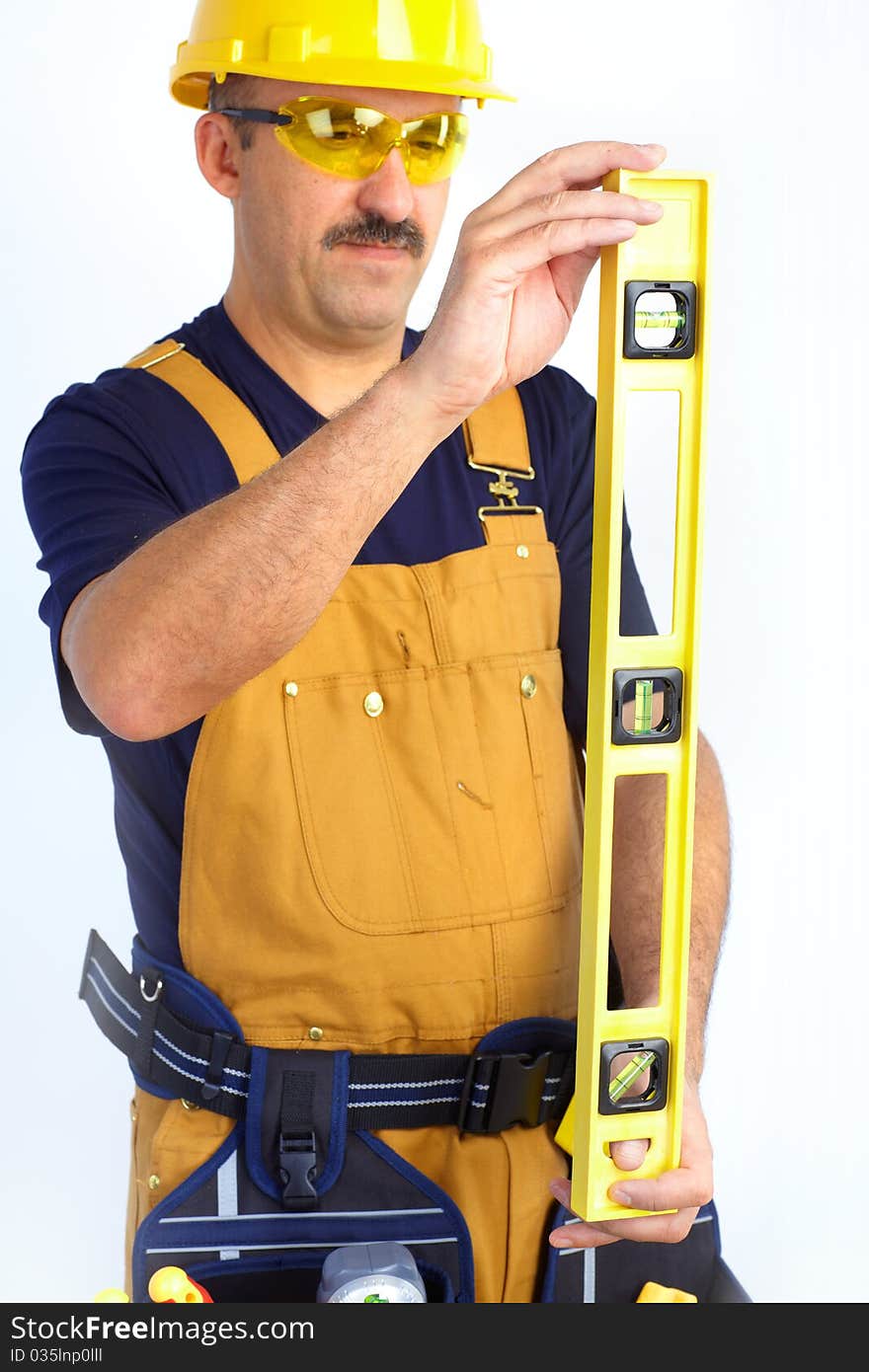 Mature contractor working. Over white background