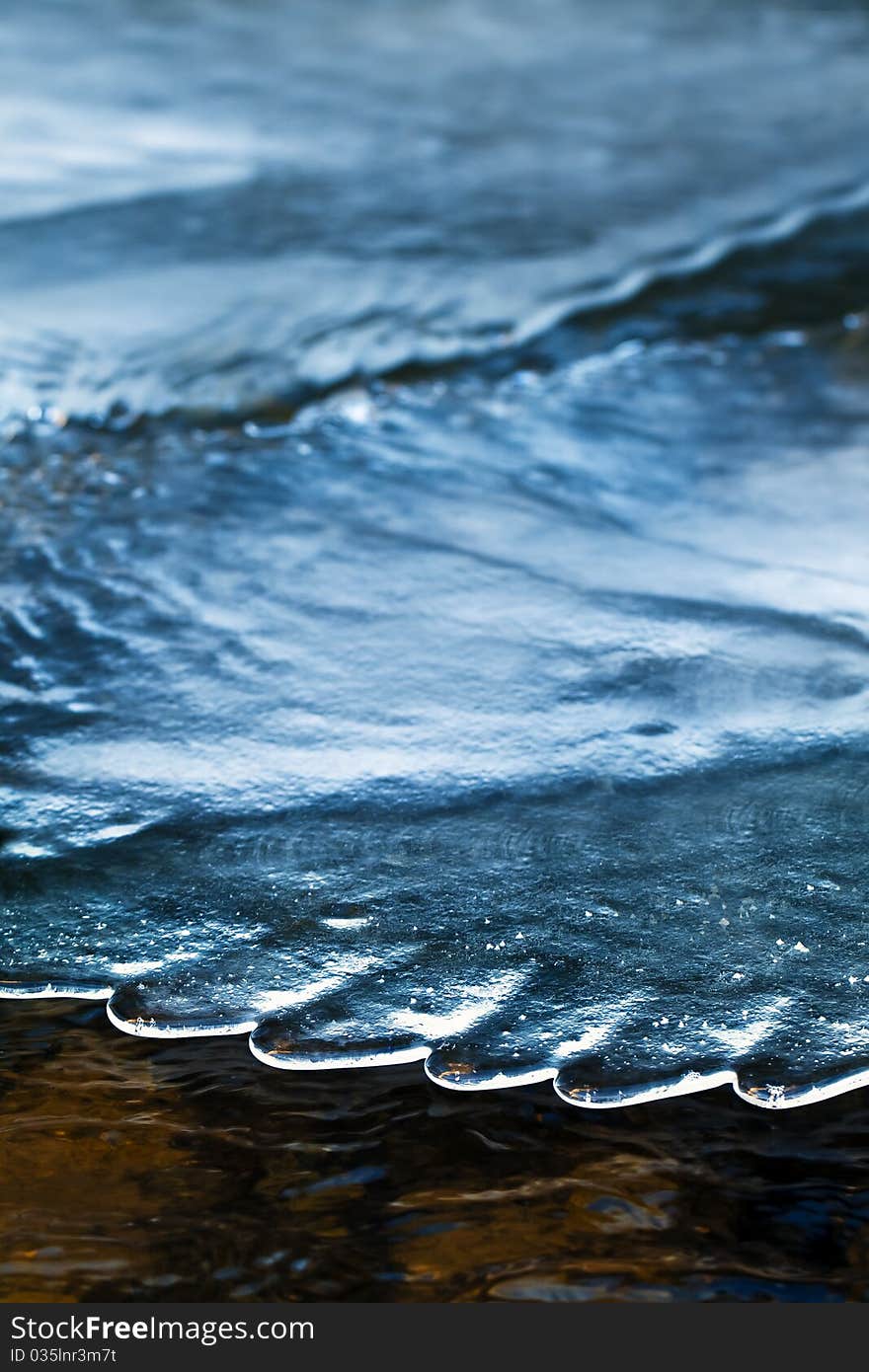 Close up of the ice texture on the surface of a river.