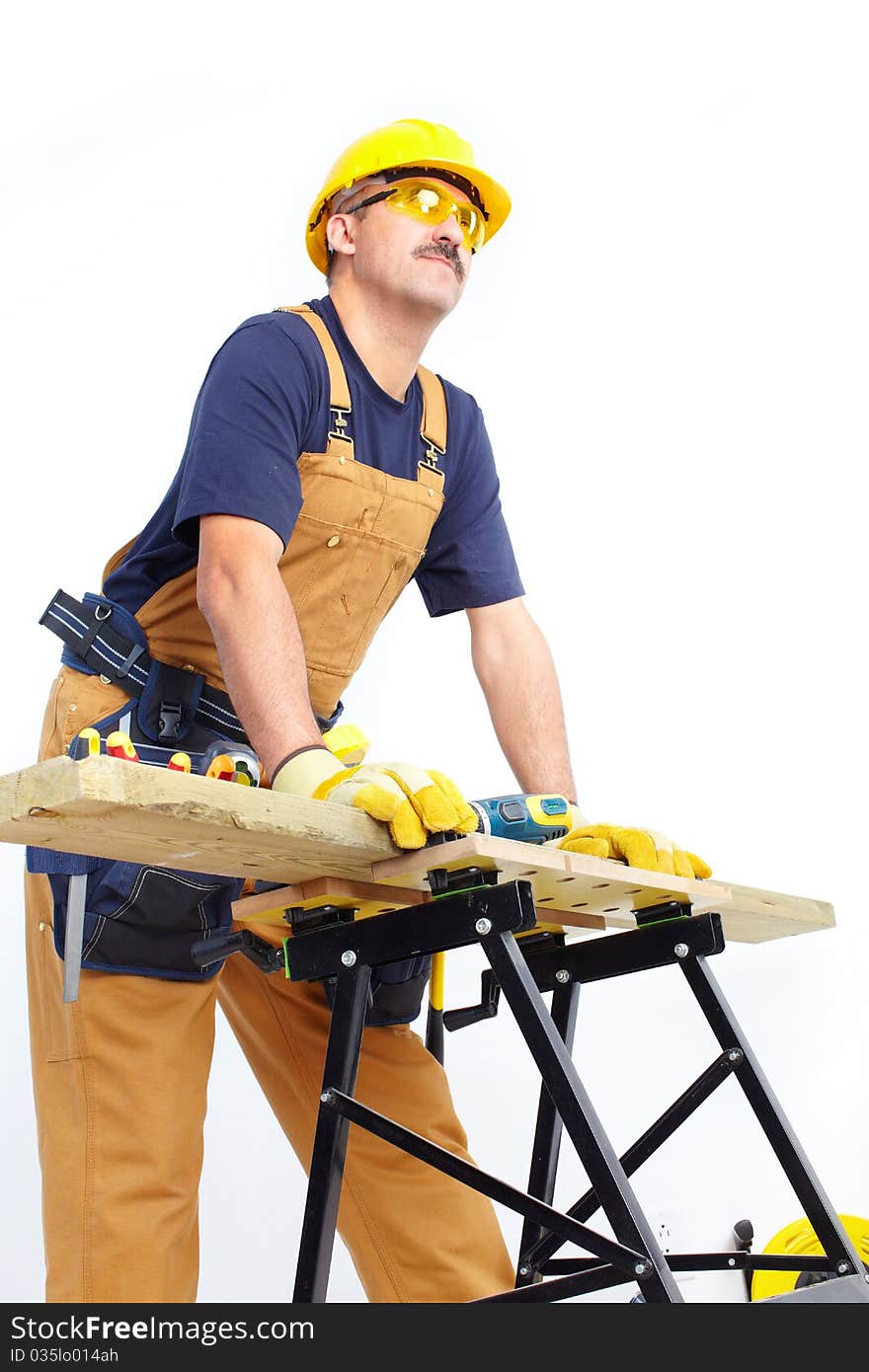 Mature contractor working. Over white background