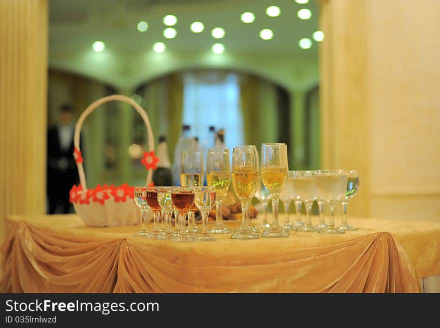 Various types of full glasses on the table at the restaurant