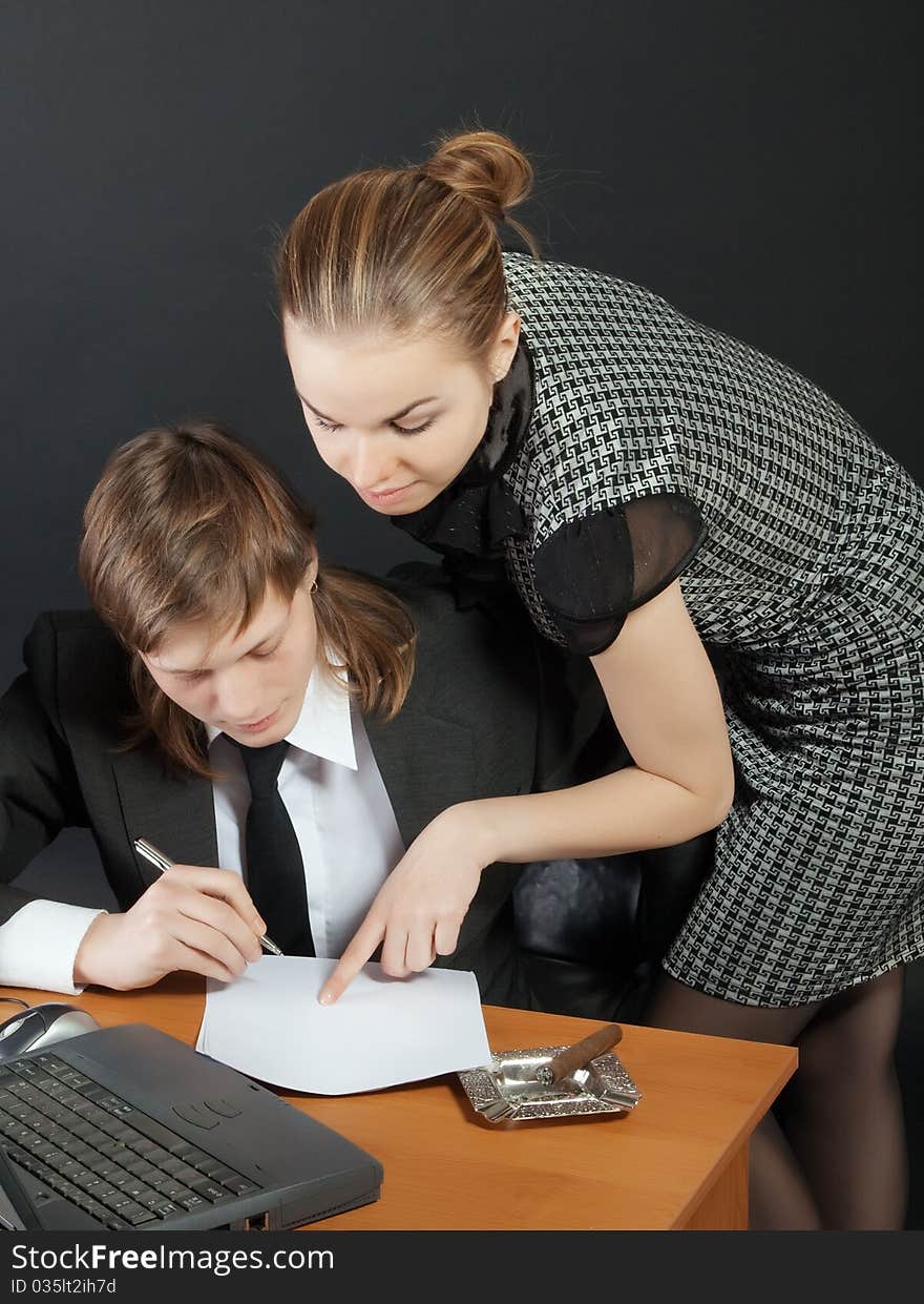 Young man and woman having a business meeting. Young man and woman having a business meeting