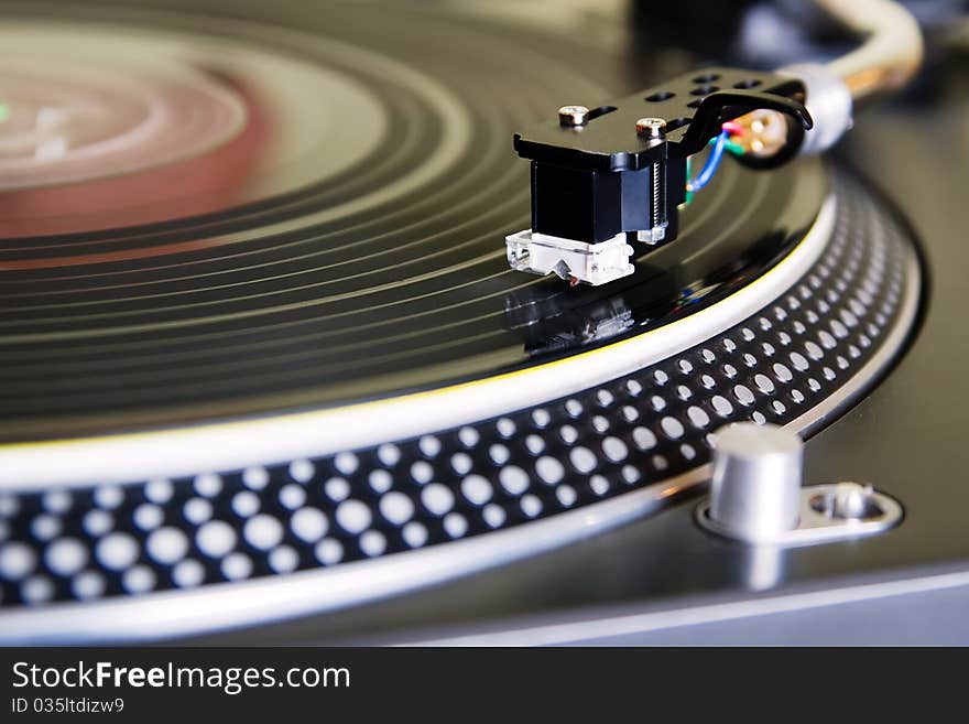 Turntable playing vinyl record