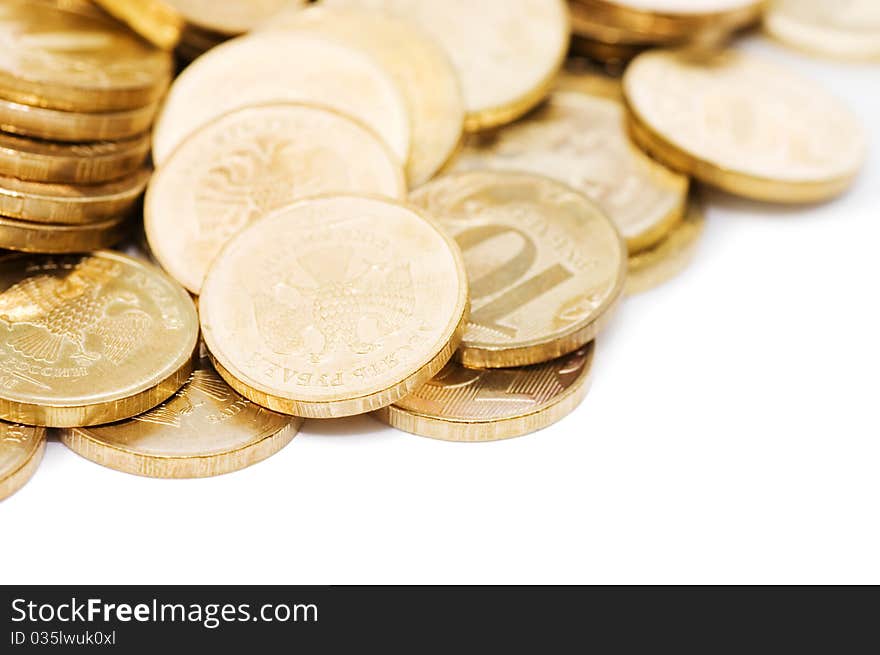 Golden coins isolated on white