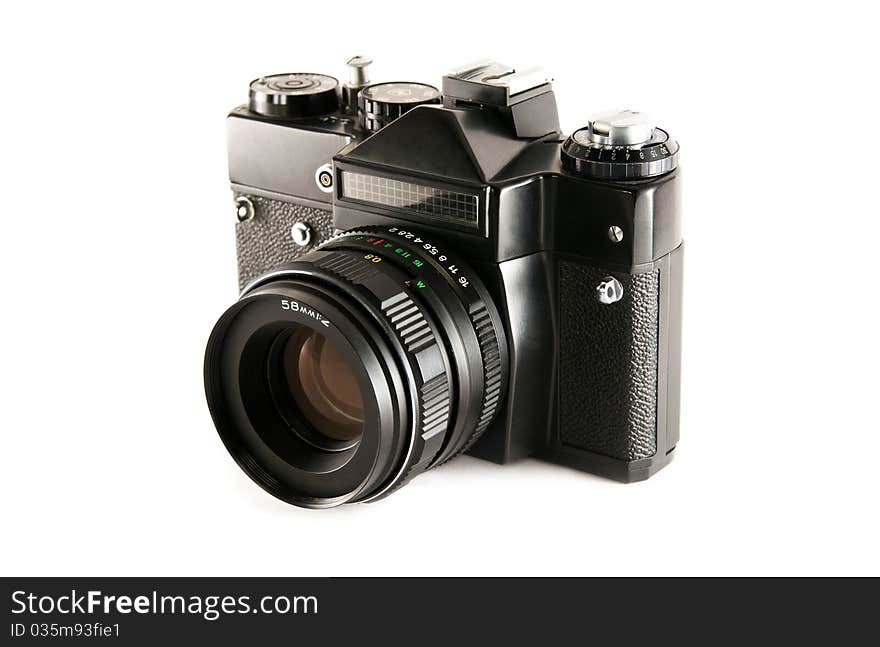 Old SLR film camera on white. Old SLR film camera on white