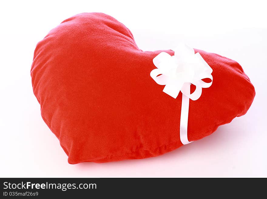 Close-up of red Valentine's heart isolated on white