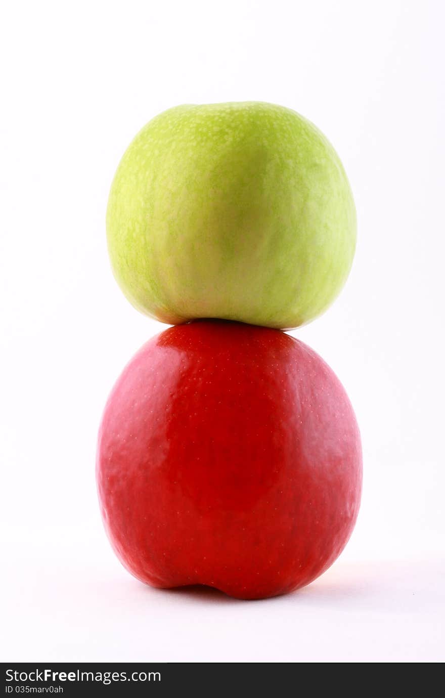 Close-up of red and green ripe apples isolated on white. Close-up of red and green ripe apples isolated on white