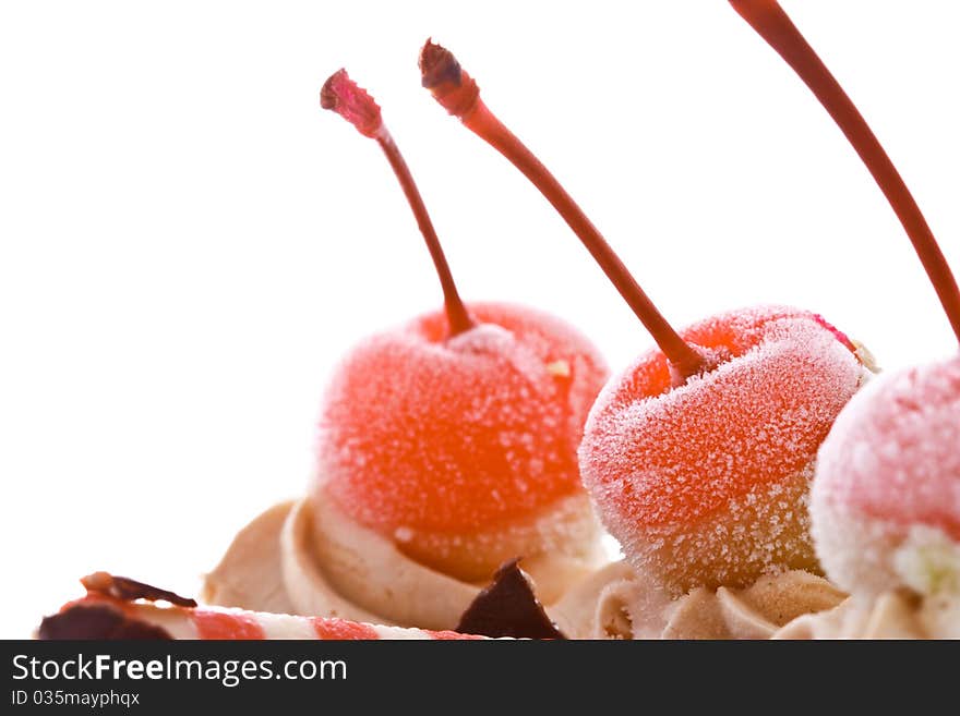 Red cherries on top of cake. Red cherries on top of cake