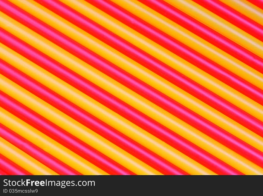 Yellow and red straws for a cocktail. Yellow and red straws for a cocktail