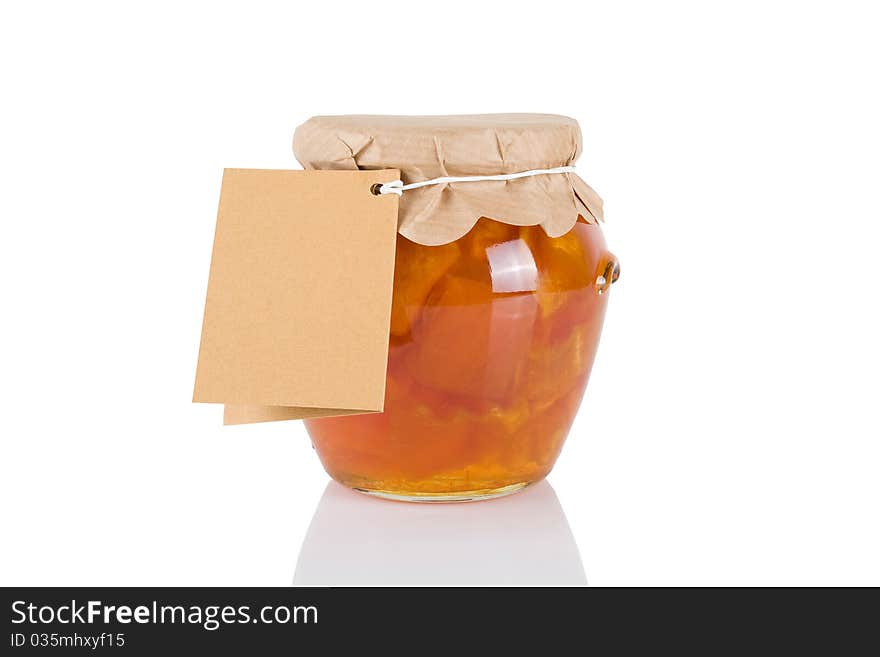 Jar with sweet of pumkins isolated on white background