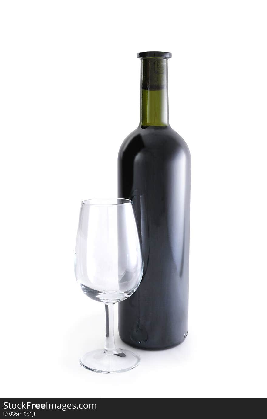 Corked bottle of red wine and an empty glass isolated on white background with clipping path. Corked bottle of red wine and an empty glass isolated on white background with clipping path