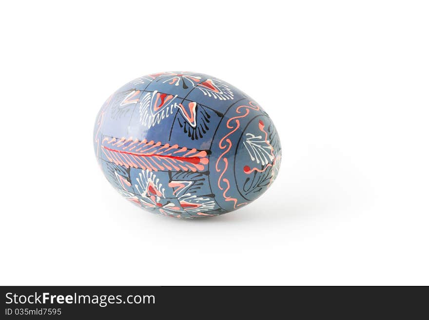 Blue painted traditional Easter egg isolated on white background with shadow. Clipping path included. Blue painted traditional Easter egg isolated on white background with shadow. Clipping path included.