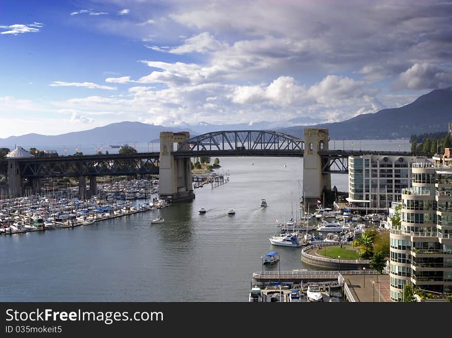 Boats passing underneath Granville bridge, Vancouver Canada