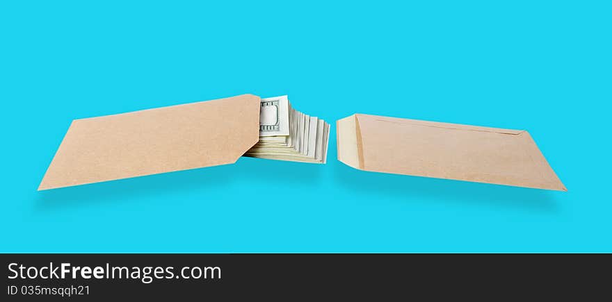 Two paper bags and dollars isolated on the blue background with clipping paths. Two paper bags and dollars isolated on the blue background with clipping paths.