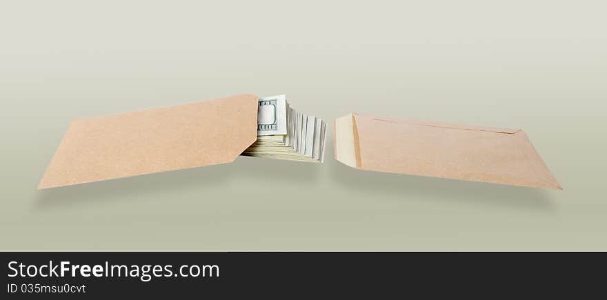 Two paper bags and dollars isolated on the gray background. Two paper bags and dollars isolated on the gray background.