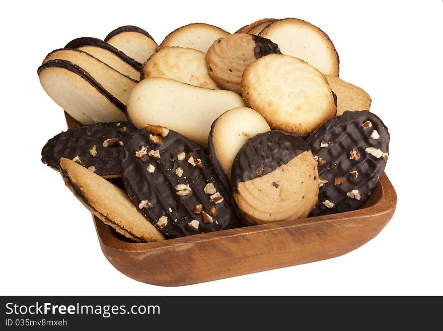 Biscuit dough with chocolate in a wooden bowl. Biscuit dough with chocolate in a wooden bowl.