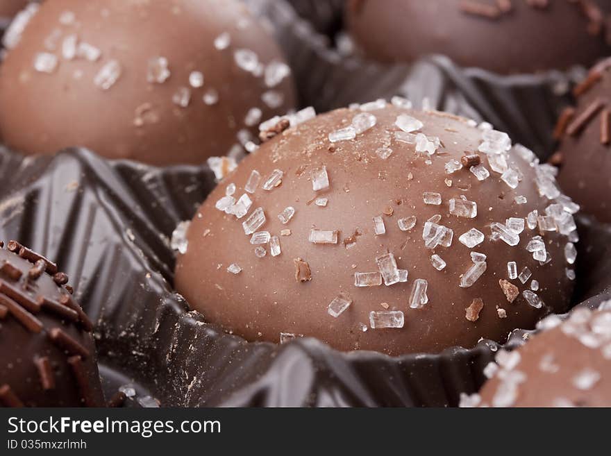 Truffle candy coated chocolate with decorative powdered for the occasion.