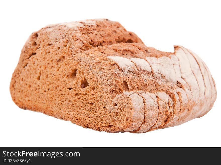 A loaf of pumpernickel bread made with natural ingredients on a white background. A loaf of pumpernickel bread made with natural ingredients on a white background.