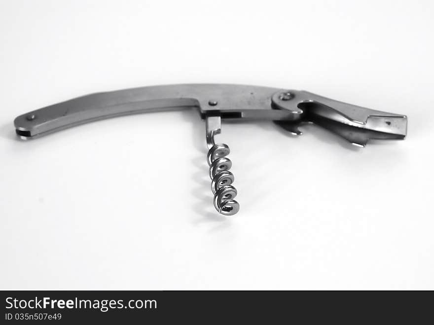 Close up of the corkscrew on the white background. Close up of the corkscrew on the white background