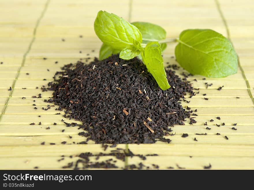 Some tea and green leafs