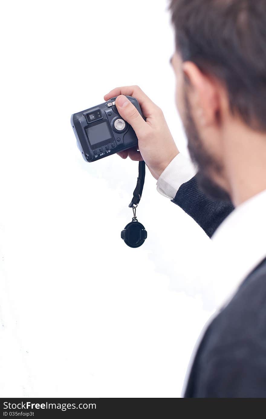 Man holding camera in his hands isolated on white. Man holding camera in his hands isolated on white