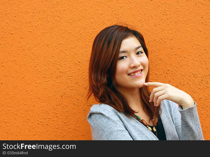 An asian girl who is smiling