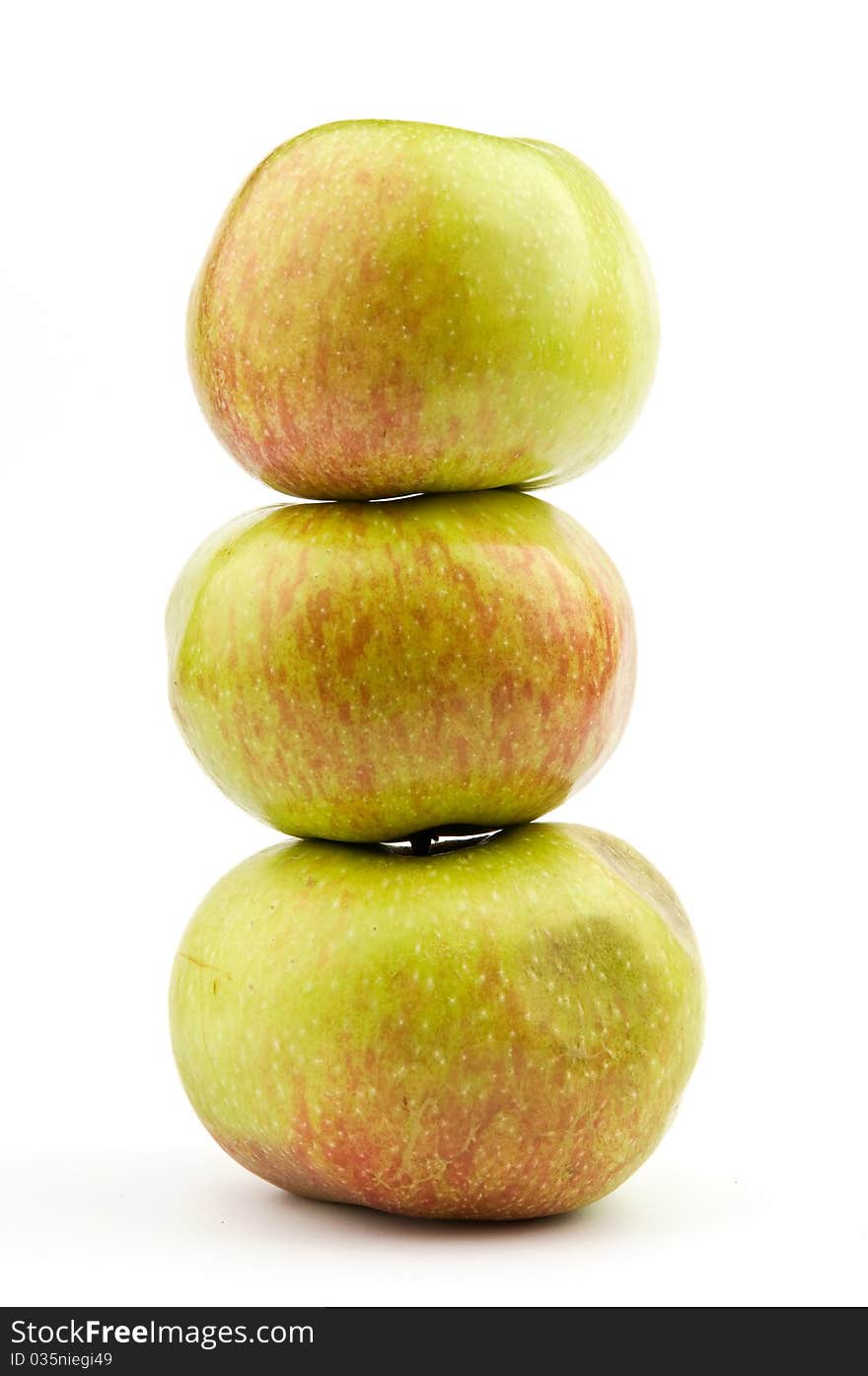 Stack of three apples over white background. Stack of three apples over white background