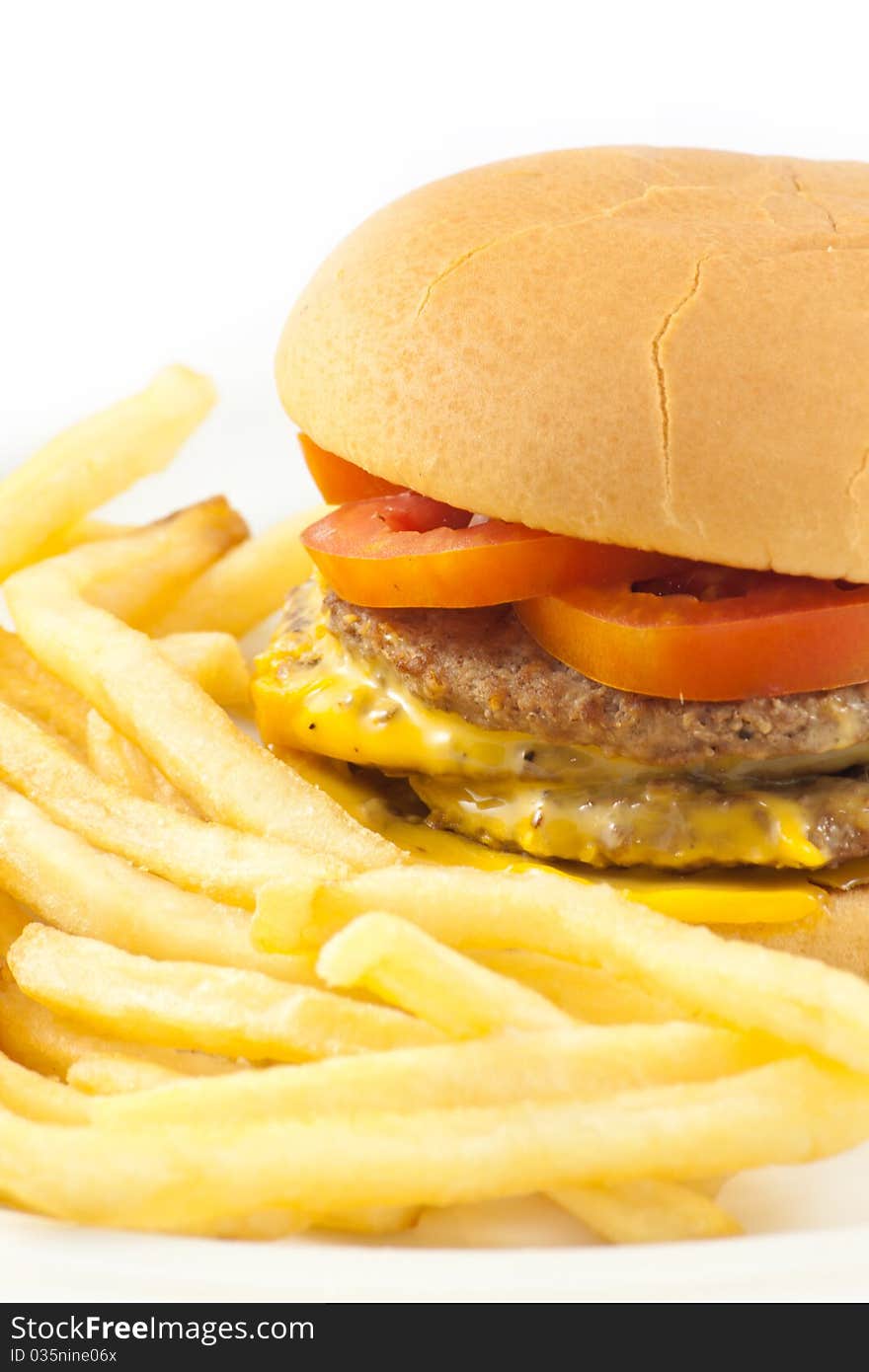 Beef and cheese Burger with french fries on white background. Beef and cheese Burger with french fries on white background