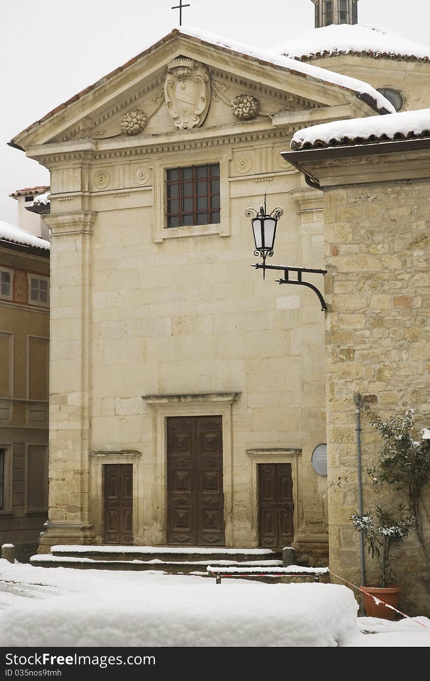 Old white church in the snow