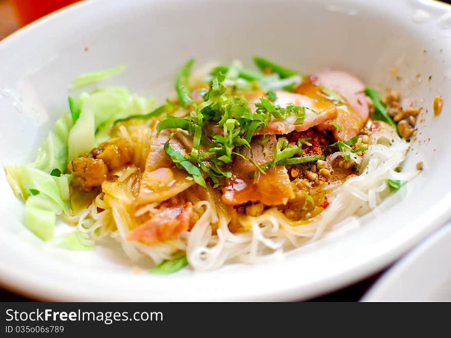 Asian style noodle with pork and vegetables