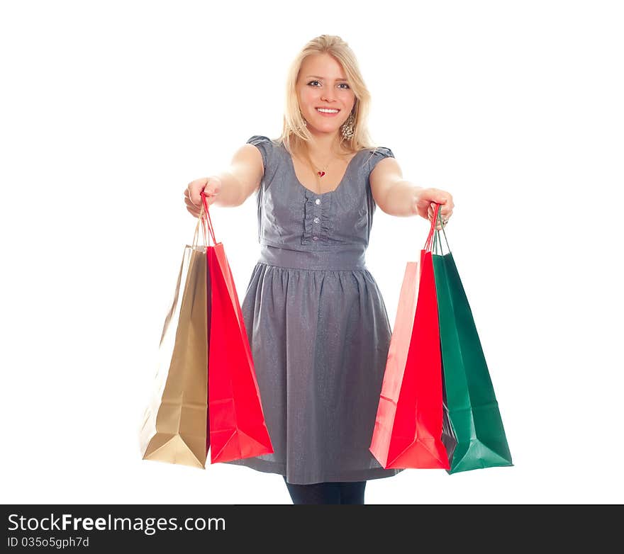 Lovely blond with shopping bags over white