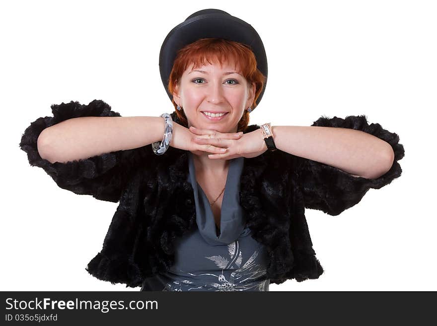 Girl in the bowler hat and a fur coat