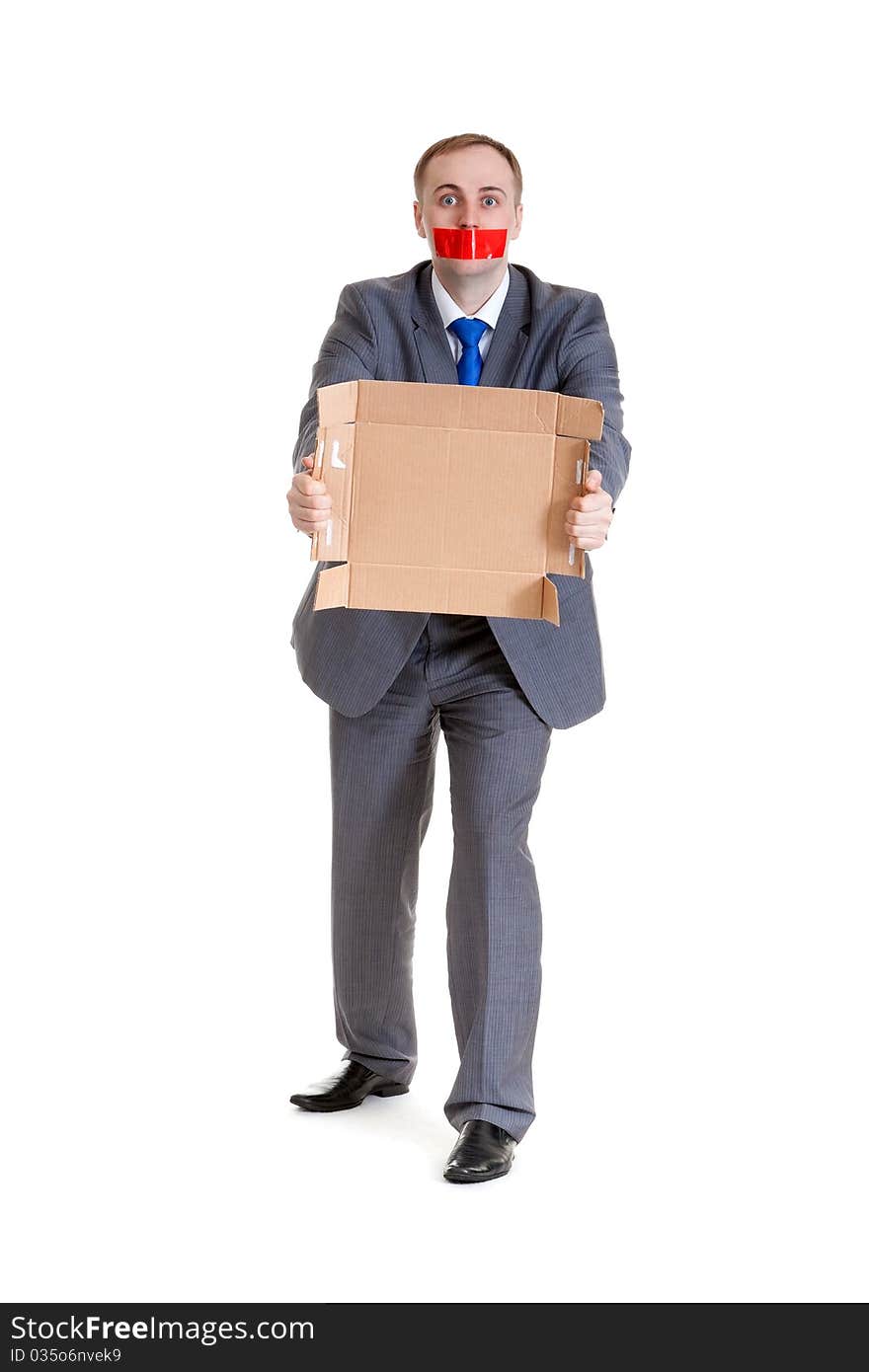 Businessman with his mouth sealed with red tape and cardboard in their hands