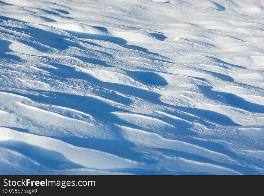 Winter abstract background for design from white snow