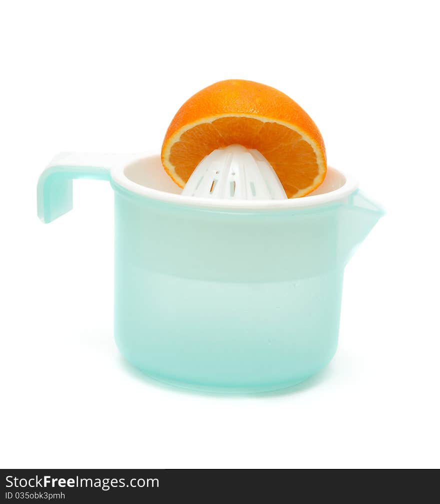 Plastic squeezer for citrus with half of the orange