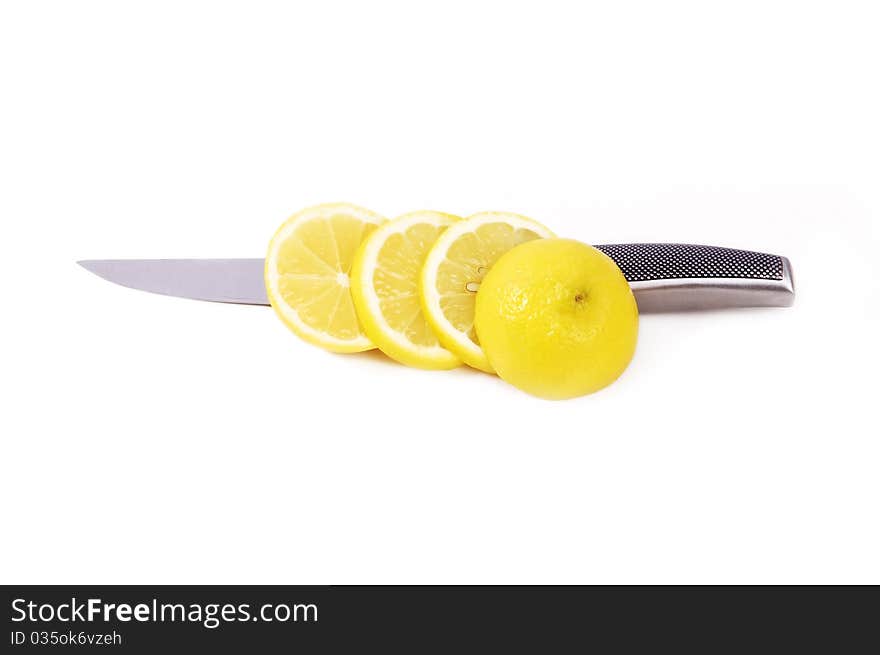 Lemon knifed on a white background. Lemon knifed on a white background