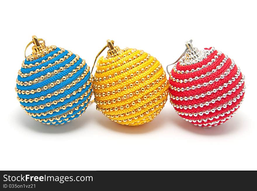 Three Christmas decorations on a white background