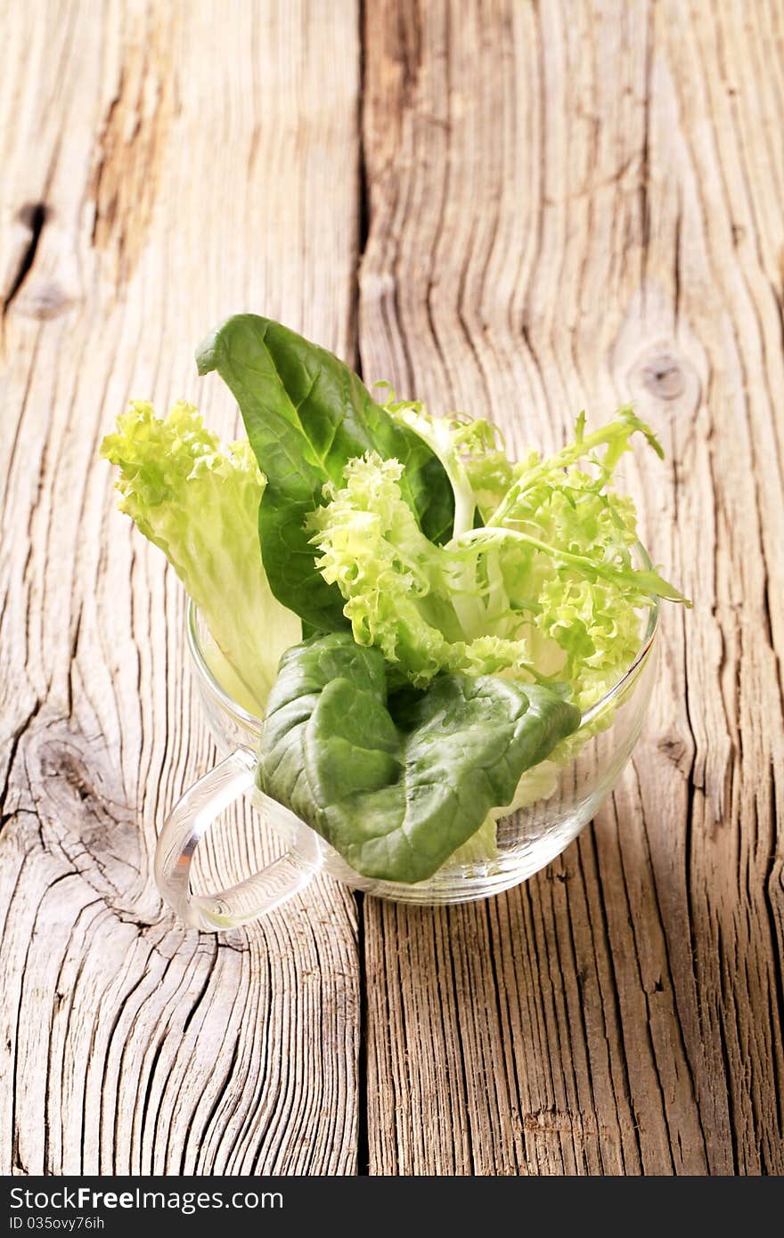 Fresh salad greens in a cup - closeup