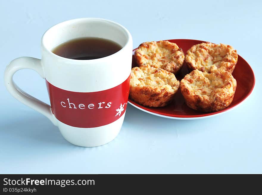 Holiday Cup Of Tea With Muffins