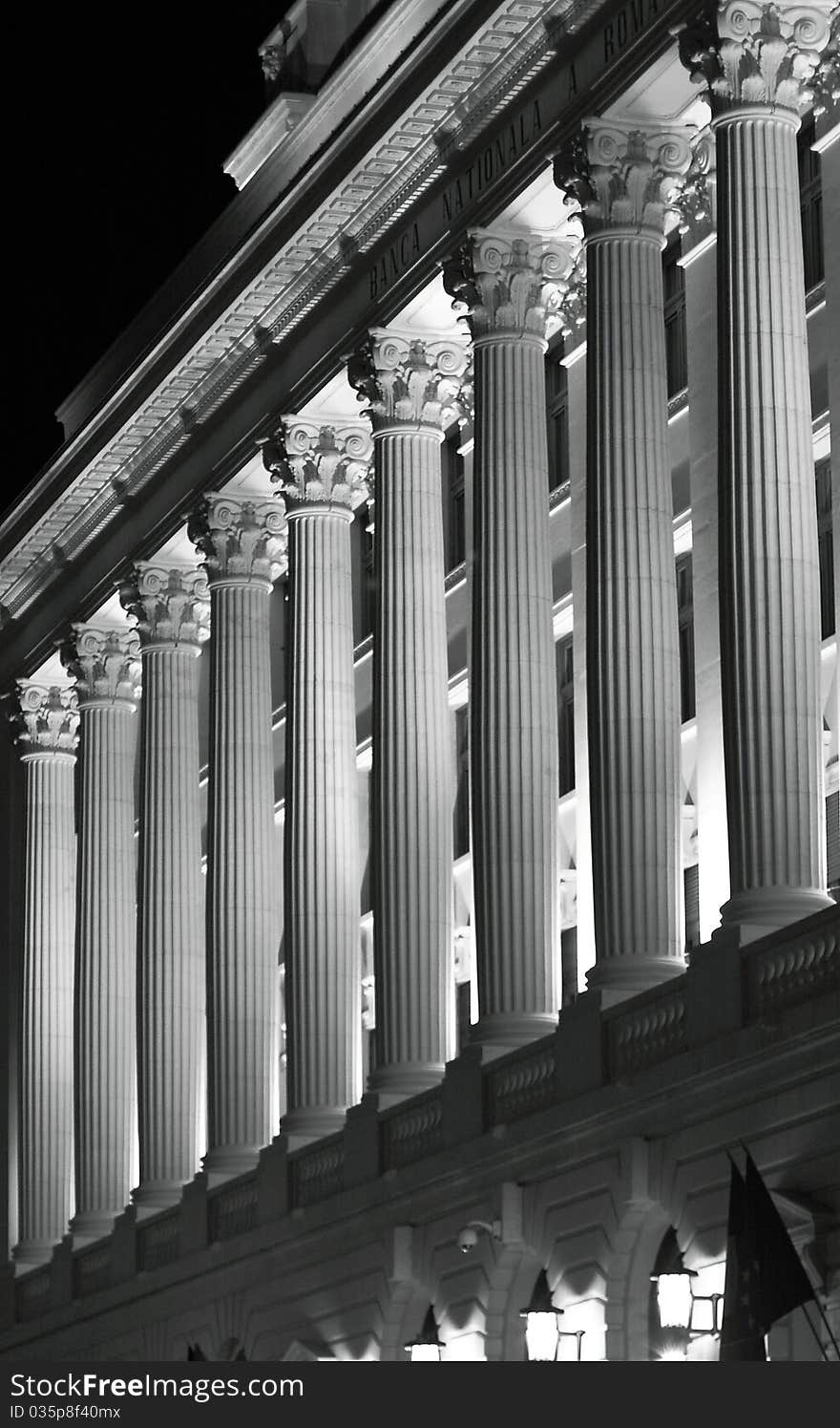 Historical building facade, at night, with classical columns. Historical building facade, at night, with classical columns