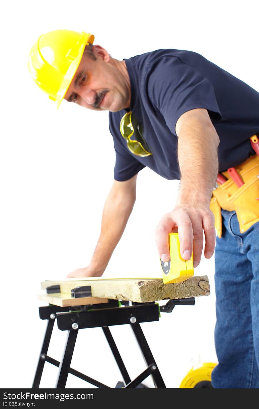 Mature contractor working. Over white background. Mature contractor working. Over white background