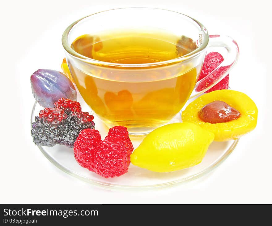 Marmalade gelatin fruits dessert and tea cup. Marmalade gelatin fruits dessert and tea cup