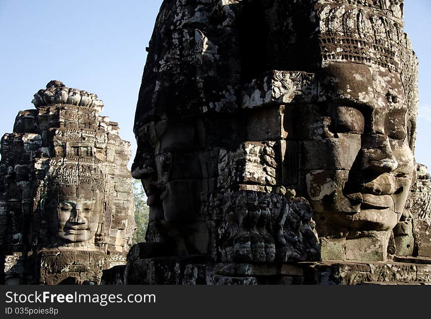 A bayon face at Angkor, Siem Reap, Cambodia. A bayon face at Angkor, Siem Reap, Cambodia.