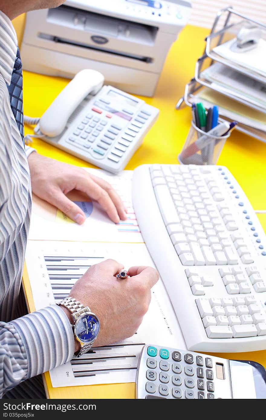 Businessman working with documents in the office