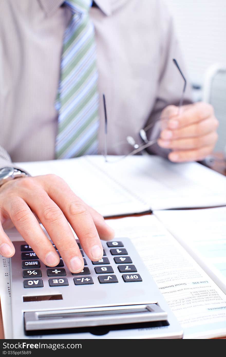 Businessman working with documents in the office