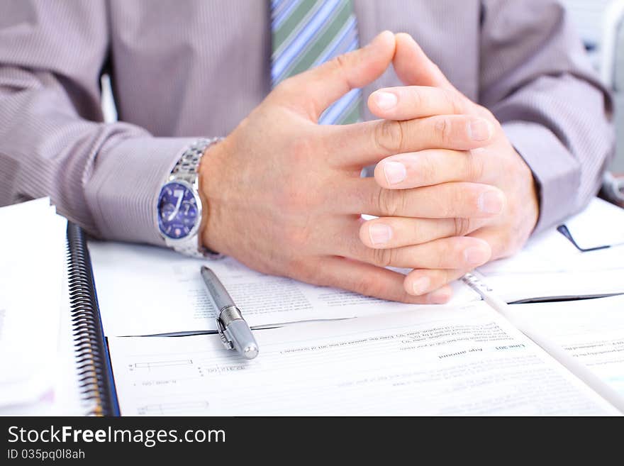 Businessman working with documents in the office