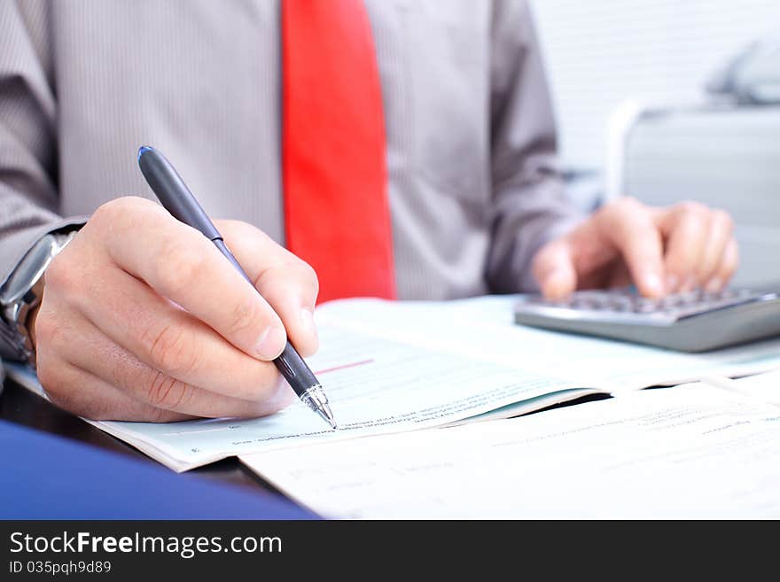 Businessman working with documents in the office