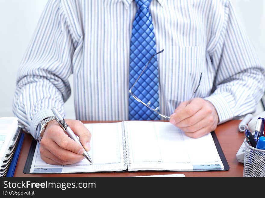 Businessman working with documents in the office